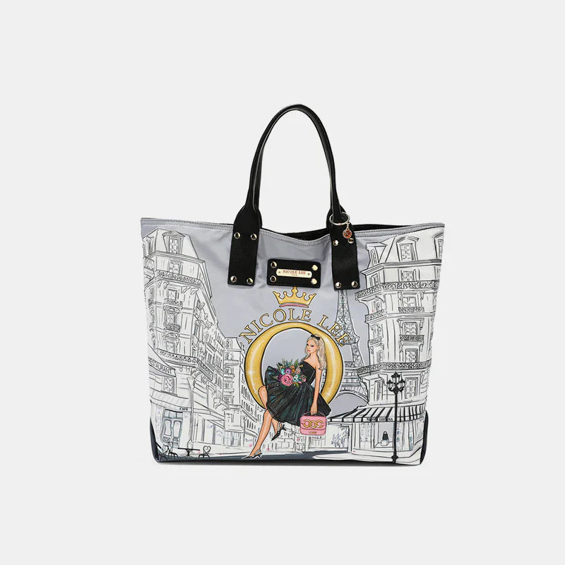 Nicole Lee crossbody handbag with comic print on model wearing denim jacket