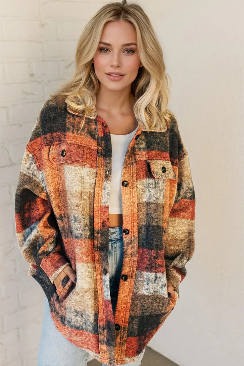 Woman styling a Double Take oversized jacket over a crop top