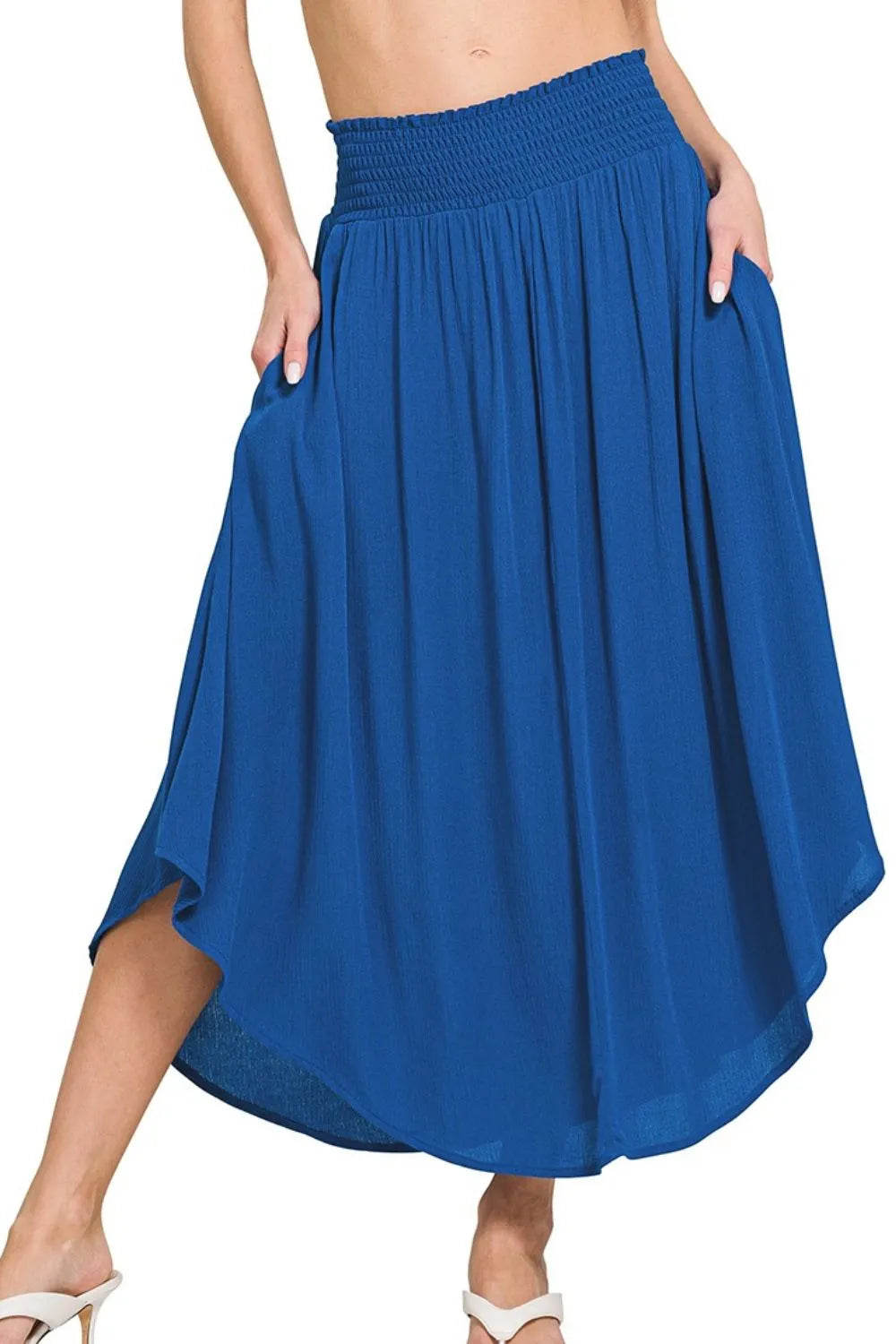 Curvy woman wearing high-waisted skirt