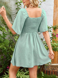 Smocked Back Knotted Flutter Sleeve Dress