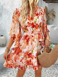 Devine Printed Surplice Ruffled 3/4 Sleeve Mini Dress