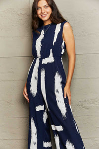 Perfee Printed Round Neck Cutout Jumpsuit with Pockets 100101645160596 34 Affordable Fashion Under $100 Jerry's Apparel 