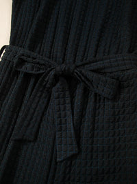 One Shoulder Short Sleeve Knotted Waist Jumpsuit